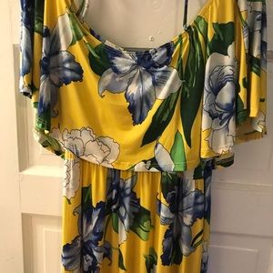 Yellow full length floral dress.